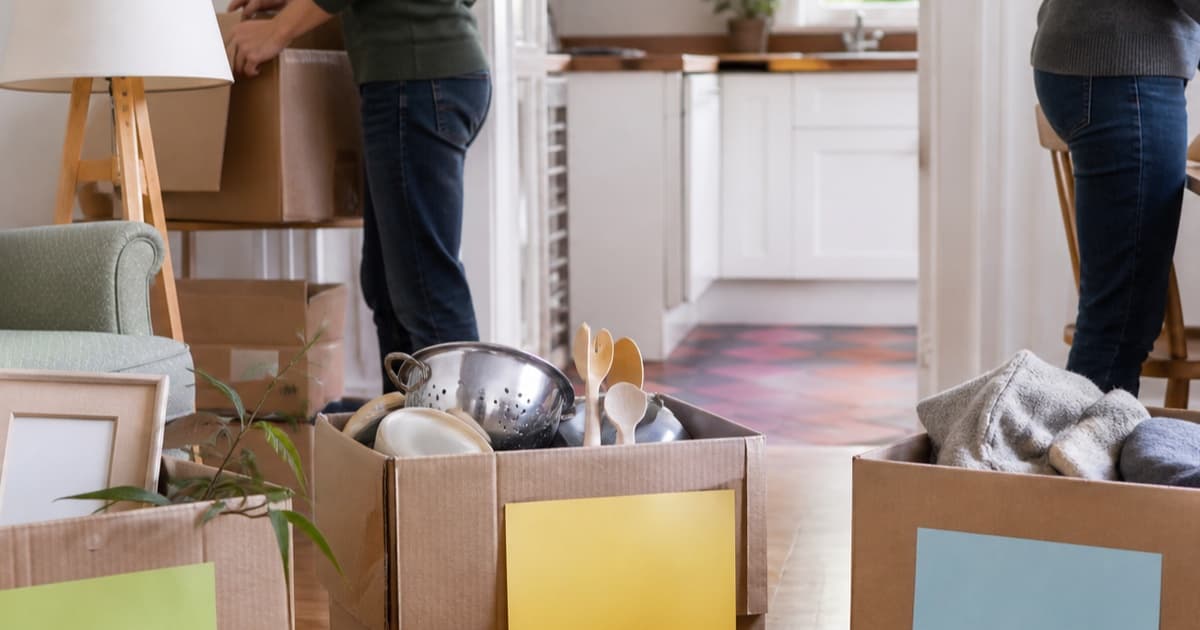 Moving boxes and household items sorted in a bright Irish home