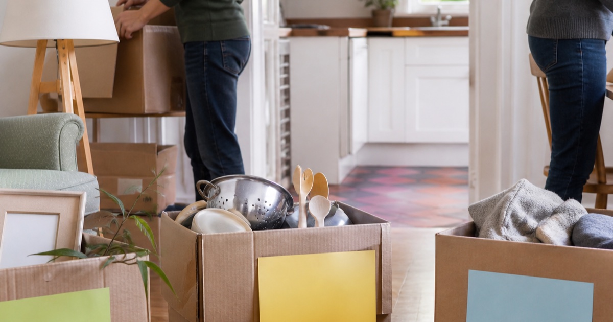Moving boxes and household items sorted in a bright Irish home
